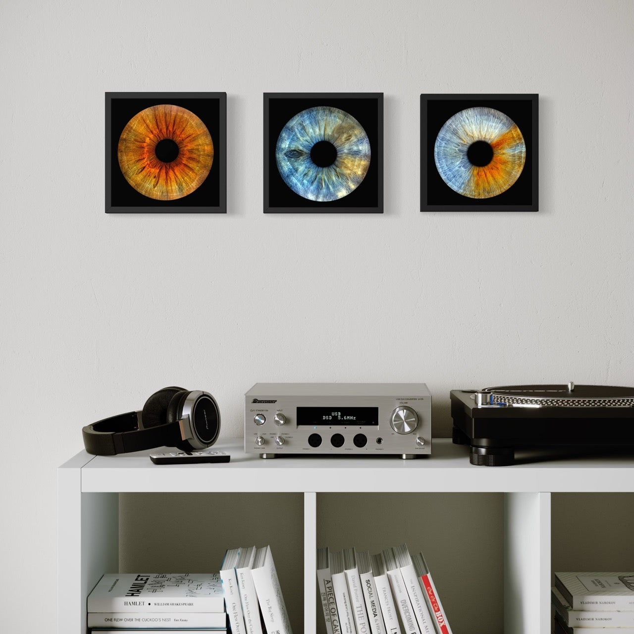 iris eye images printed onto photo tiles and hanging on the wall