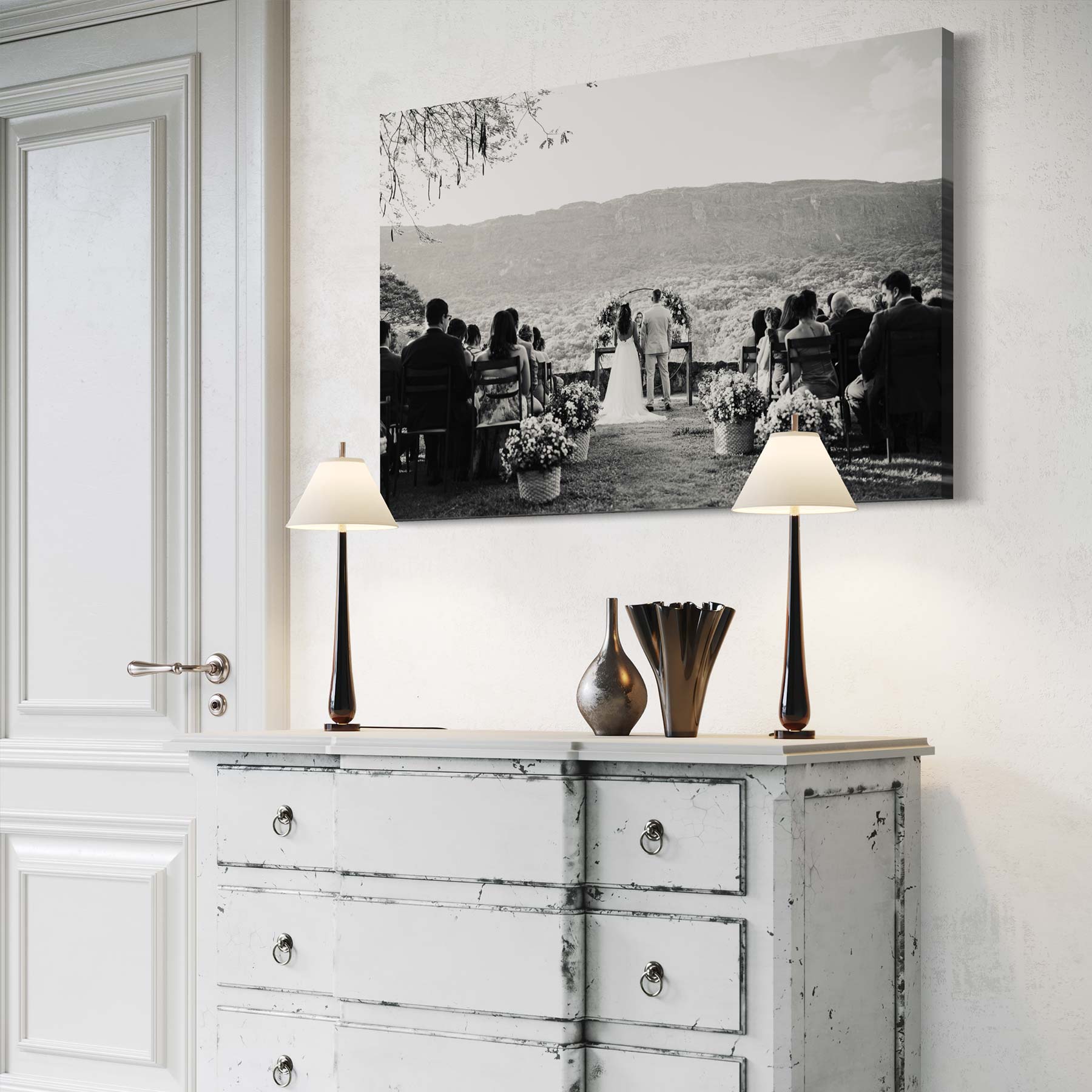 wedding canvas print hanging on a wall above a chest of drawers