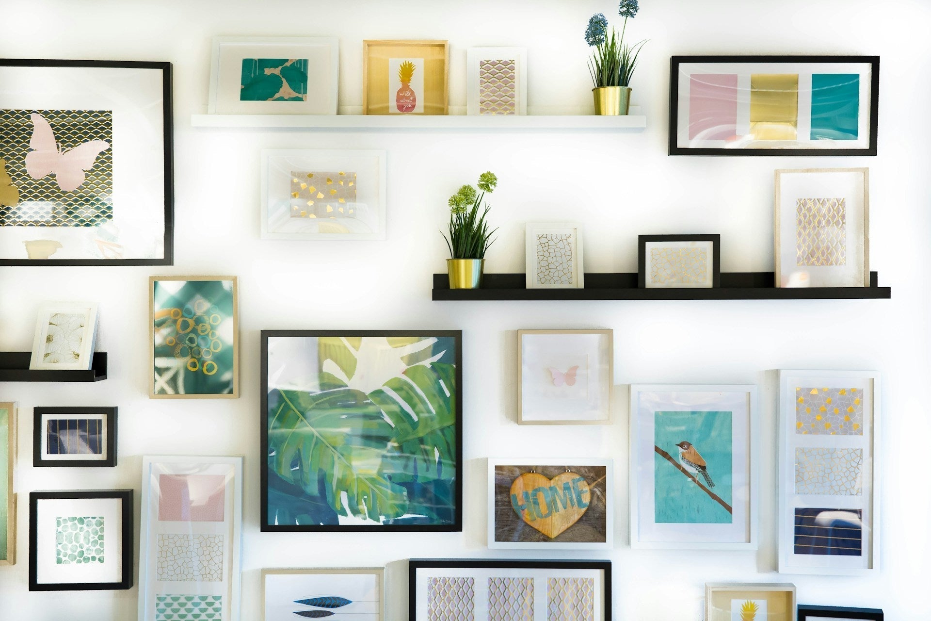 How to arrange photos on staircase walls