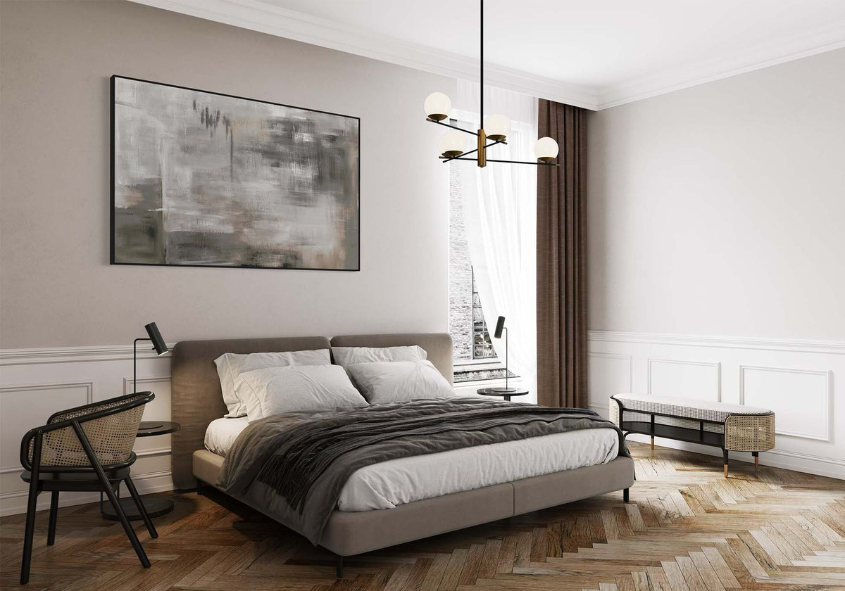 Framed photographic wall art above a bed in a boutique hotel