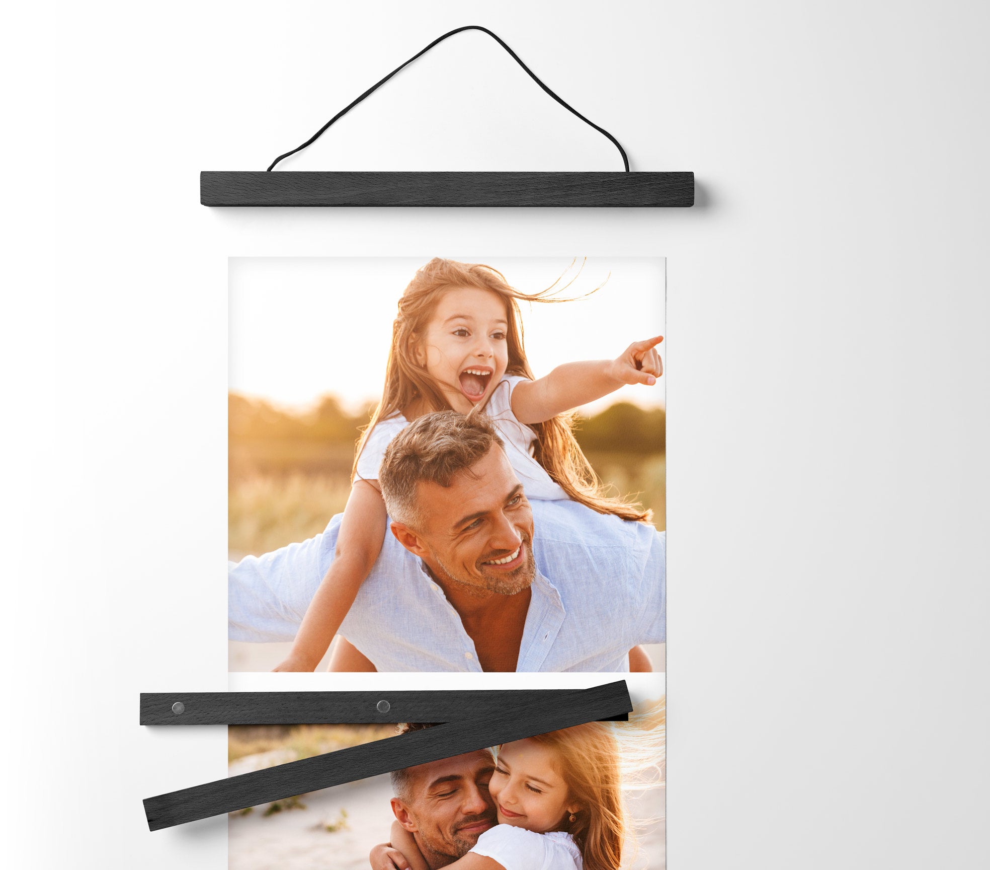 The Memory Strip photo collage with wooden hangers and magnetic fasteners