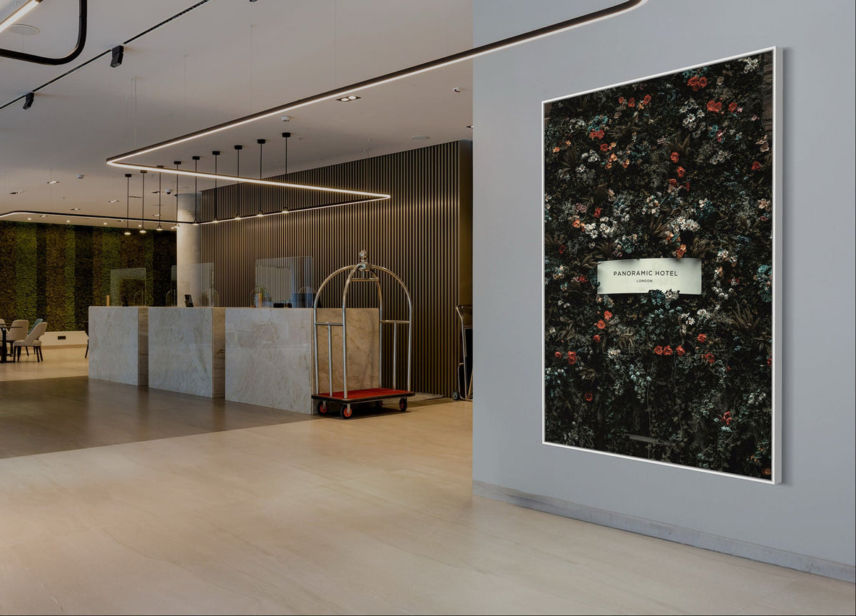 Large framed wall art in a commercial reception area