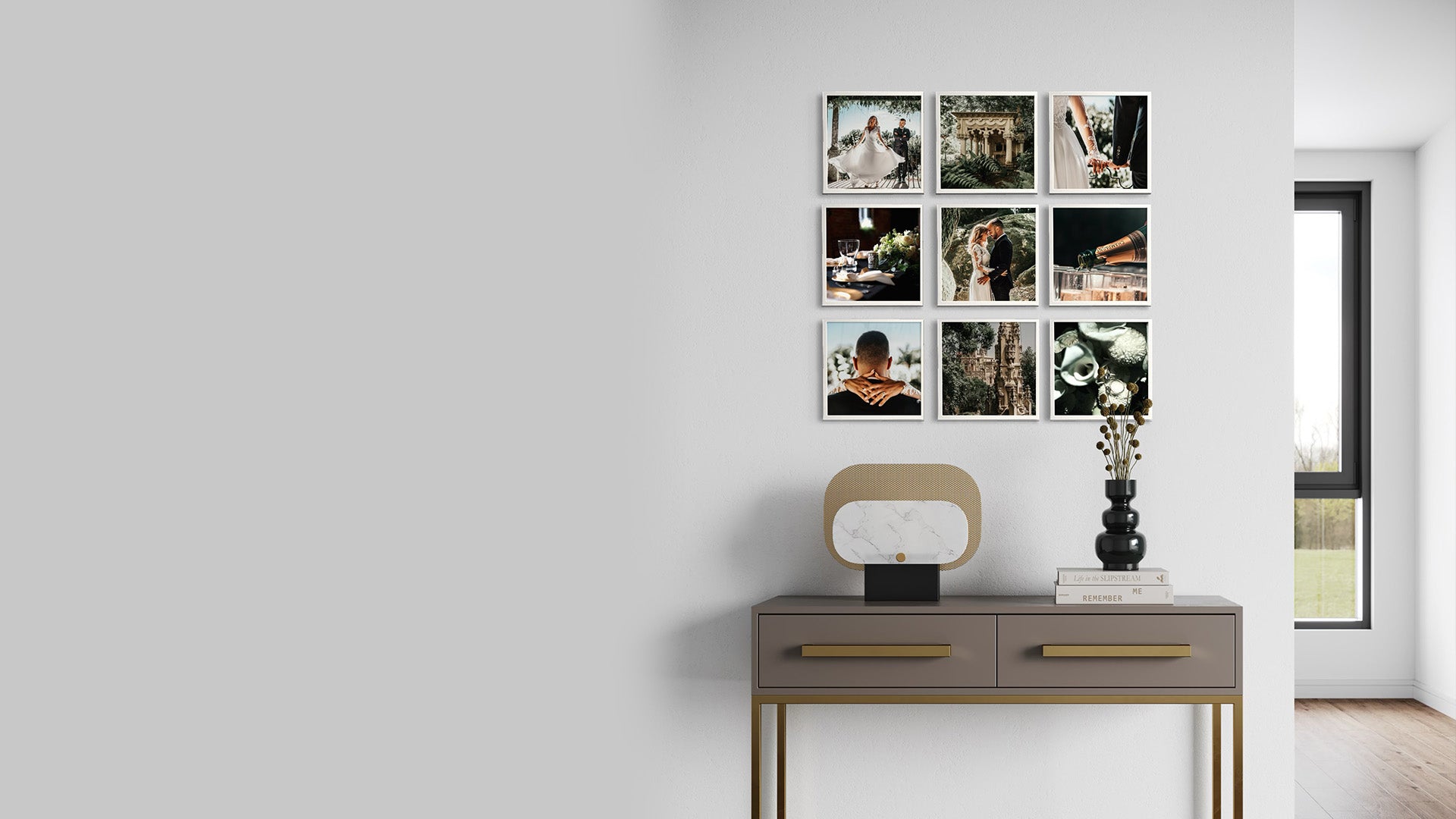 9 white framed photo tiles in hallway