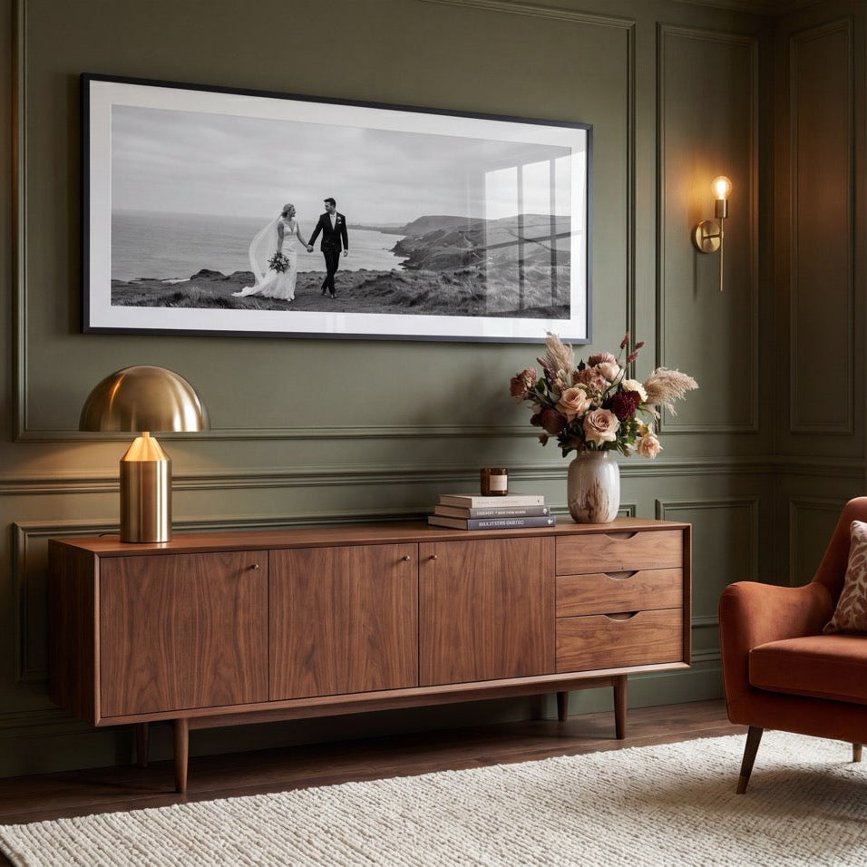 Framed wedding photo on living room wall